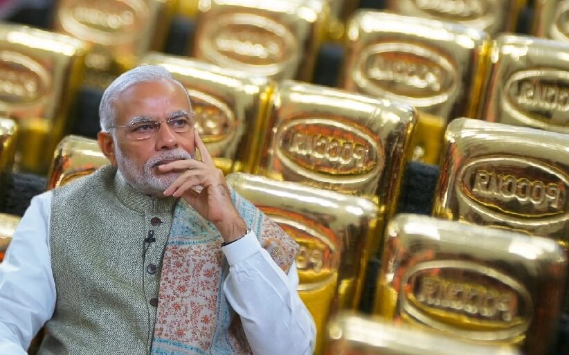 Indischer Premierminister Modi und Goldbarren